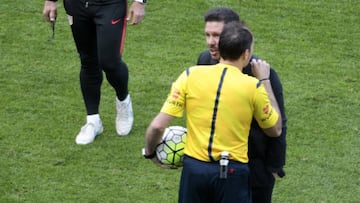 Simeone sent off after ball is thrown onto pitch during play