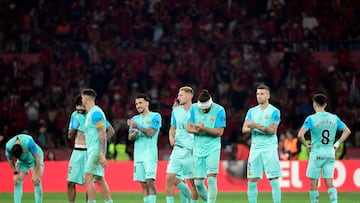 Mallorca players react during the penalty shootout after the Spanish Copa del Rey (King's Cup) final football match between Athletic Club Bilbao and RCD Mallorca at La Cartuja stadium in Seville on April 6, 2024. (Photo by CRISTINA QUICLER / AFP)