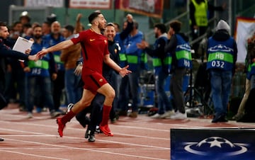 Kostas Manolas celebrates after scoring.