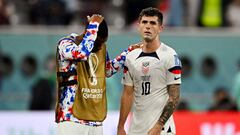 Soccer Football - FIFA World Cup Qatar 2022 - Round of 16 - Netherlands v United States - Khalifa International Stadium, Doha, Qatar - December 3, 2022 Christian Pulisic and Kellyn Acosta of the U.S. look dejected after the match as United States are eliminated from the World Cup REUTERS/Dylan Martinez     TPX IMAGES OF THE DAY