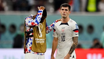 Soccer Football - FIFA World Cup Qatar 2022 - Round of 16 - Netherlands v United States - Khalifa International Stadium, Doha, Qatar - December 3, 2022 Christian Pulisic and Kellyn Acosta of the U.S. look dejected after the match as United States are eliminated from the World Cup REUTERS/Dylan Martinez     TPX IMAGES OF THE DAY