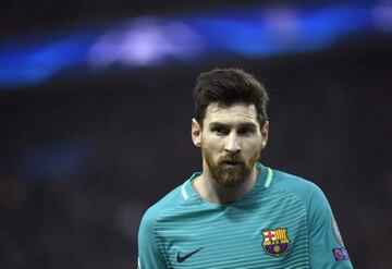 Barcelona's Argentinian forward Lionel Messi looks on during the UEFA Champions League round of 16 first leg game.