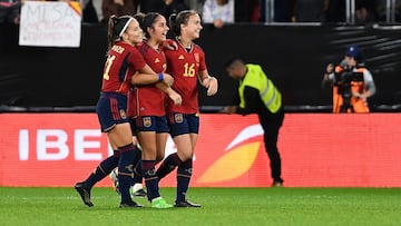 (From L) Spain's defender Claudia Zornoza, Spain's midfielder Rosa Marquez and Spain's forward Ane Azkona celebrate after winning the women's international friendly football match between Spain and USA at El Sadar stadium in Pamplona on October 11, 2022. (Photo by ANDER GILLENEA / AFP)