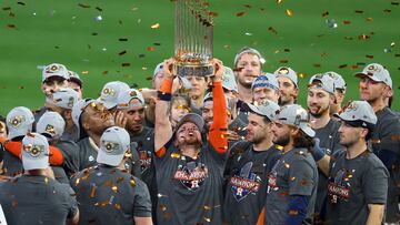 Nov 5, 2022; Houston, Texas, USA; Houston Astros designated hitter Christian Vazquez (9) and teammates hoist the World Series trophy after defeating the Philadelphia Phillies in game six and winning the 2022 World Series at Minute Maid Park. Mandatory Credit: Thomas Shea-USA TODAY Sports     TPX IMAGES OF THE DAY