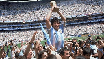 **  FILE  ** Argentina's Diego Maradona, holding up the trophy, is carried on shoulders as he celebrates at the end of the World Cup soccer final game against West Germany at the Atzeca Stadium, in Mexico City, in this June 29, 1986, file photo. Argentina won 3-2. Maradona and Argentinean coach Carlos Bilardo have been asked to lead Argentina by Julio Grondona, head of the Argentine Football Association, Tuesday, Oct. 28, 2008. (AP Photo/Carlo Fumagalli, file)