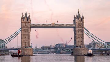 Marco Fuerst and Marco Waltenspiel of Austria fly through Tower Bridge in London, Great Britain on May 12, 2024.