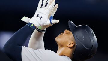 TORONTO, CANADA - JUNE 28: Juan Soto #22 of the New York Yankees celebrates on base after hitting a single in the ninth inning of their MLB game against the Toronto Blue Jays at Rogers Centre on June 28, 2024 in Toronto, Ontario, Canada.   Cole Burston/Getty Images/AFP (Photo by Cole Burston / GETTY IMAGES NORTH AMERICA / Getty Images via AFP)