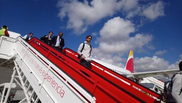 Sergio Ramos emerges from Real Madrid's plane at the Josep Tarradellas airport in Barcelona.