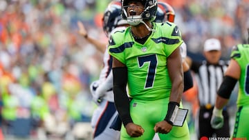 Seattle Seahawks quarterback Geno Smith reacts following a play against the Denver Broncos during the second quarter at Lumen Field.