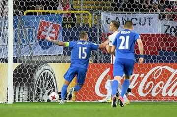 Slovakia's forward Adam Zrelak (L) and Slovakia's midfielder Matus Bero celebrate scoring during the UEFA U-21 European Championship Group A football match Poland v Slovakia in Lublin, Poland on June 16, 2017.