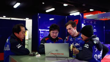 MONTMELO, SPAIN - MARCH 08:  Pierre Gasly of France and Scuderia Toro Rosso talks with Honda employees in the garage during day three of F1 Winter Testing at Circuit de Catalunya on March 8, 2018 in Montmelo, Spain.  (Photo by Dan Istitene/Getty Images)