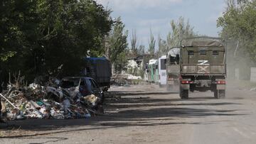 MARIUPOL, May 21, 2022  -- Vehicles carrying service members of the Ukrainian armed forces leave Mariupol, May 20, 2022.
   Russian forces have &quot;completely liberated&quot; the Azovstal steel plant in Mariupol, the Russian Defense Ministry said Friday