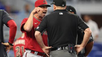 MIAMI, FLORIDA - MAY 04: Manager Torey Lovullo #17 of the Arizona Diamondbacks argues with umpires Dan Bellino #2 and Adrian Johnson #80 after Madison Bumgarner #40 (not pictured) was ejected from the game during the first inning against the Miami Marlins at loanDepot park on May 04, 2022 in Miami, Florida. (Photo by Michael Reaves/Getty Images)