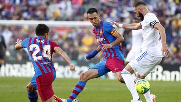 Sergio Busquets, ante Benzema.