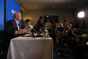 Gianni Infantino addresses a press conference in Cardiff.