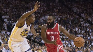 October 17, 2017; Oakland, CA, USA; Houston Rockets guard James Harden (13) dribbles the basketball against Golden State Warriors forward Kevin Durant (35) during the first quarter at Oracle Arena. Mandatory Credit: Kyle Terada-USA TODAY Sports