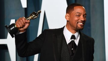 (FILES) In this file photo taken on March 28, 2022 US actor Will Smith holds his award for Best Actor in a Leading Role for &quot;King Richard&quot; as he attends the 2022 Vanity Fair Oscar Party following the 94th Oscars at the The Wallis Annenberg Cente