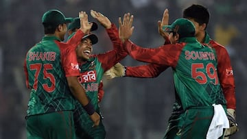 Bangladesh&#039;s Mushfiqur Rahim (2nd-L) celebrates with teammates after the dismissal of Sri Lanka&#039;s Dasun Shanaka during the Asia Cup T20 cricket tournament match between Bangladesh and Sri Lankaat at the Sher-e-Bangla National Cricket Stadium in 