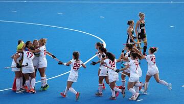 LONDON, ENGLAND - AUGUST 01:  Spain players celebrate their victory over Germany during the Quarter Final game between Germany and Spain of the FIH Womens Hockey World Cup at Lee Valley Hockey and Tennis Centre on August 1, 2018 in London, England.  (Phot