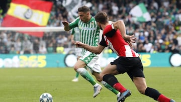GRAF5509. SEVILLA, 08/12/2019.- El centrocampista Joaquín Sánchez (i) del Real Betis disputa el balón con el defensa Yeray Álvarez del Athletic de Bilbao, durante el partido de la decimosexta jornada de LaLiga Santander de prim