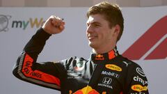 Red Bull Racing&#039;s Dutch driver Max Verstappen celebrates on the podium after the Austrian Formula One Grand Prix in Spielberg on June 30, 2019. - Max Verstappen won the Austrian Grand Prix after overtaking Charles Leclerc&#039;s Ferrari in the closing laps with the stewards announcing an inquiry into the manoeuvre. (Photo by GEORG HOCHMUTH / APA / AFP) / Austria OUT