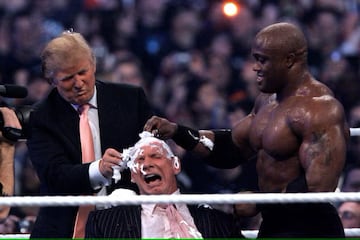 Donald Trump shaving Vince McMahon.