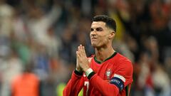 Portugal's forward #07 Cristiano Ronaldo reacts after scoring in a penalty shoot-out during the UEFA Euro 2024 round of 16 football match between Portugal and Slovenia at the Frankfurt Arena in Frankfurt am Main on July 1, 2024. (Photo by PATRICIA DE MELO MOREIRA / AFP)