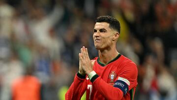 Portugal's forward #07 Cristiano Ronaldo reacts after scoring in a penalty shoot-out during the UEFA Euro 2024 round of 16 football match between Portugal and Slovenia at the Frankfurt Arena in Frankfurt am Main on July 1, 2024. (Photo by PATRICIA DE MELO MOREIRA / AFP)
