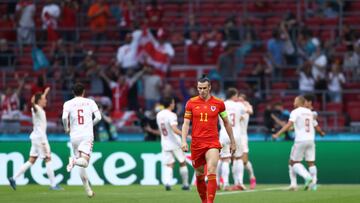 AMSTERDAM, NETHERLANDS - JUNE 26: Gareth Bale of Wales looks dejected after the Denmark second goal scored by Kasper Dolberg (Not pictured) of Denmark during the UEFA Euro 2020 Championship Round of 16 match between Wales and Denmark at Johan Cruijff Aren