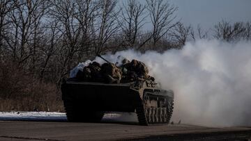 Ukrainian service members ride atop of a BMP-2 infantry fighting vehicle near a frontline, amid Russia's attack on Ukraine, in Donetsk region, Ukraine February 8, 2023. REUTERS/Yevhenii Zavhorodnii