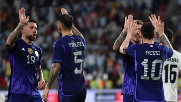 Argentina's forward Lionel Messi (R) celebrates with teammates after scoring during the friendly football match between Argentina and the United Arab Emirates at the Mohammed Bin Zayed Stadium in Abu Dhabi, on November 16, 2022. (Photo by Ryan LIM / AFP)