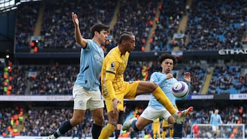 Soccer Football - Premier League - Manchester City v Brighton & Hove Albion - Etihad Stadium, Manchester, Britain - March 15, 2025 Brighton & Hove Albion's Joao Pedro in action with Manchester City's Abdukodir Khusanov and Rico Lewis REUTERS/Phil Noble EDITORIAL USE ONLY. NO USE WITH UNAUTHORIZED AUDIO, VIDEO, DATA, FIXTURE LISTS, CLUB/LEAGUE LOGOS OR 'LIVE' SERVICES. ONLINE IN-MATCH USE LIMITED TO 120 IMAGES, NO VIDEO EMULATION. NO USE IN BETTING, GAMES OR SINGLE CLUB/LEAGUE/PLAYER PUBLICATIONS. PLEASE CONTACT YOUR ACCOUNT REPRESENTATIVE FOR FURTHER DETAILS..