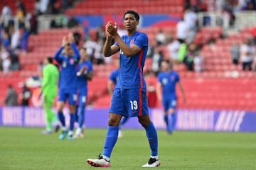 England's midfielder Jude Bellingham claps the fans after the international friendly football match between England and Romania.