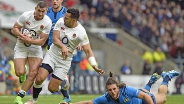 Jonny May evita el tackle de Michele Campagnaro.