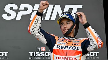 Third placed Honda Spanish rider Marc Marquez celebrates on the podium after the sprint race of the MotoGP Valencia Grand Prix at the Ricardo Tormo racetrack in Cheste, on November 25, 2023. (Photo by JAVIER SORIANO / AFP)