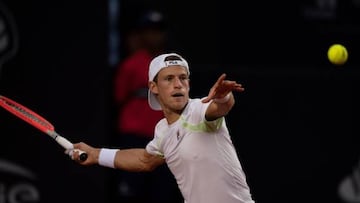 Argentina's Diego Schwartzman returns the ball to Spain's Carlos Alcaraz during their ATP World Tour Rio Open 2022 final tennis match at the Jockey Club in Rio de Janeiro, Brazil, on February 20, 2022. (Photo by CARL DE SOUZA / AFP) (Photo by CARL DE SOUZA/AFP via Getty Images)