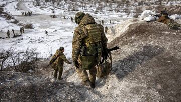 DONBAS, UKRAINE - FEBRUARY 24: Ukrainian Army replacement troops go through combat training on February 24, 2023 in the Donbas region of eastern Ukraine. According to the group's commander, the unit was badly depleted in recent weeks of vicious fighting against Russian Wagner mercenary forces, losing more than half its combat strength due to wounded and killed in action. He said that although his troops routinely decimate large groups of enemy forces, who attack his frontline positions in wave after wave of frontal assaults, the Russians still inflict significant damage. Fresh Ukrainian recruits are now being quickly trained, so the unit can return to the frontline at full strength. One year ago, Russia's military invaded Ukraine from three sides and launched airstrikes across the country. Since then, Moscow has withdrawn from north and central parts of Ukraine, focusing its assault on the eastern Donbas region, where it had supported a separatist movement since 2014. (Photo by John Moore/Getty Images)