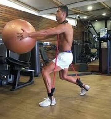 Cristiano doing his best Atlas impersonation in the gym.