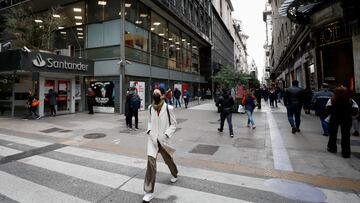 People walk in downtown Buenos Aires, Argentina, July 4, 2022. REUTERS/Agustin Marcarian