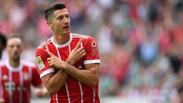 Bayern Munich&#039;s Polish striker Robert Lewandowski celebrates scoring during the German first division Bundesliga football match Werder Bremen vs Bayern Munich in Bremen, nothern Germany, on August 26, 2017. / AFP PHOTO / PATRIK STOLLARZ / RESTRICTIONS: DURING MATCH TIME: DFL RULES TO LIMIT THE ONLINE USAGE TO 15 PICTURES PER MATCH AND FORBID IMAGE SEQUENCES TO SIMULATE VIDEO. == RESTRICTED TO EDITORIAL USE == FOR FURTHER QUERIES PLEASE CONTACT DFL DIRECTLY AT + 49 69 650050
 