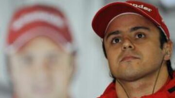Felipe Massa (derecha) y Fernando Alonso.