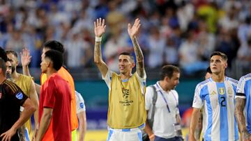 Argentina's forward #11 Angel Di Maria (C) acknowledges supporters following their team's victory in the Conmebol 2024 Copa America tournament group A football match between Argentina and Peru at Hard Rock Stadium in Miami, Florida on June 29, 2024. (Photo by Chris ARJOON / AFP)