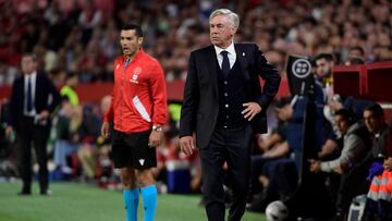 Real Madrid's Italian coach Carlo Ancelotti looks on during the Spanish league football match between Sevilla FC and Real Madrid CF at the Ramon Sanchez Pizjuan stadium in Seville on October 21, 2023. (Photo by CRISTINA QUICLER / AFP)