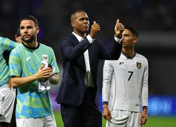 Soccer Football - World Cup - AFC Qualifiers - Group C - Japan v Indonesia - Suita City Stadium, Suita, Japan - June 10, 2025 Indonesia coach Patrick Kluivert applauds fans after the match REUTERS/Issei Kato