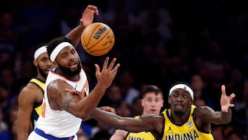 Mitchell Robinson #23 of the New York Knicks and Pascal Siakam #43 of the Indiana Pacers.