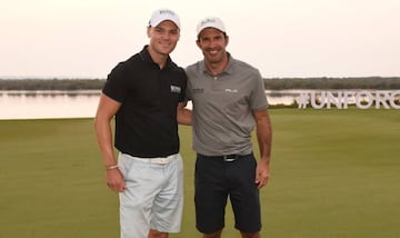 ABU DHABI, UNITED ARAB EMIRATES - JANUARY 13: Martin Kaymer (L) and Luis Figo pose at the 18th green during The Abu Dhabi Invitational at Yas Links Golf Course on January 13, 2018 in Abu Dhabi, United Arab Emirates.