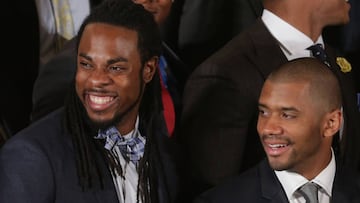 WASHINGTON, DC - MAY 21:  Seattle Seahawks cornerback Richard Sherman and quarterback Russell Wilson participates in a ceremony honoring the players, coaches and executives of the Super Bowl XLVIII champions in the East Room of the White House May 21, 2014 in Washington, DC. U.S. President Barack Obama honored the Seahawks and their 43-8 win over the Denver Broncos last February.  (Photo by Chip Somodevilla/Getty Images)