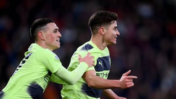 BOURNEMOUTH, ENGLAND - FEBRUARY 25: Julian Alvarez of Manchester City celebrates with team mate Phil Foden after scoring their sides first goal during the Premier League match between AFC Bournemouth and Manchester City at Vitality Stadium on February 25, 2023 in Bournemouth, England. (Photo by Manchester City FC/Manchester City FC via Getty Images)