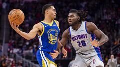 Nov 19, 2021; Detroit, Michigan, USA; Golden State Warriors guard Jordan Poole (3) looks to pass the ball against Detroit Pistons center Isaiah Stewart (28) during the second quarter at Little Caesars Arena. Mandatory Credit: Raj Mehta-USA TODAY Sports