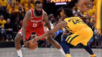 SALT LAKE CITY, UT - MAY 06: Donovan Mitchell #45 of the Utah Jazz knocks the ball from the hands of James Harden #13 of the Houston Rockets in the second half during Game Four of Round Two of the 2018 NBA Playoffs at Vivint Smart Home Arena on May 6, 201